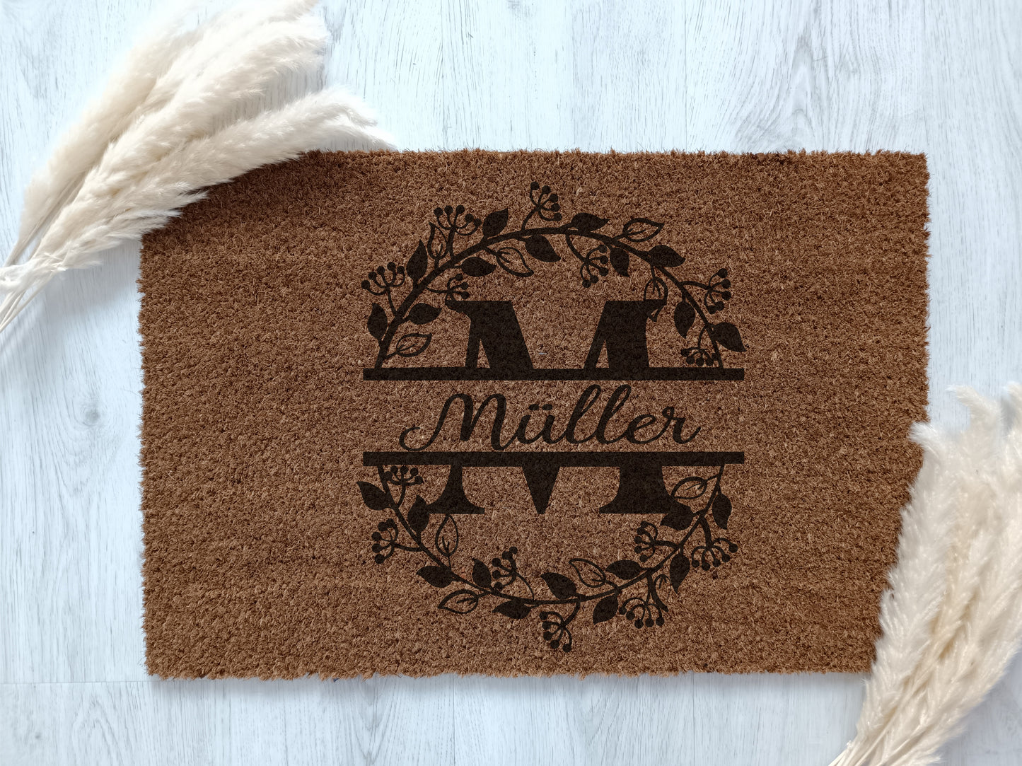 Personalized doormat with your name as a monogram made of coconut